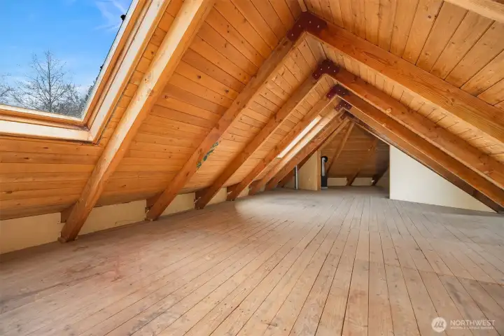 Above it all, a massive unfinished loft spans both bedrooms.