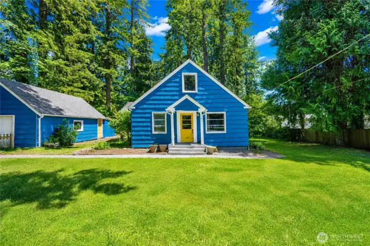 Nice, flat lot is a nice blend of open space and trees. Detached two car garage with shop space.