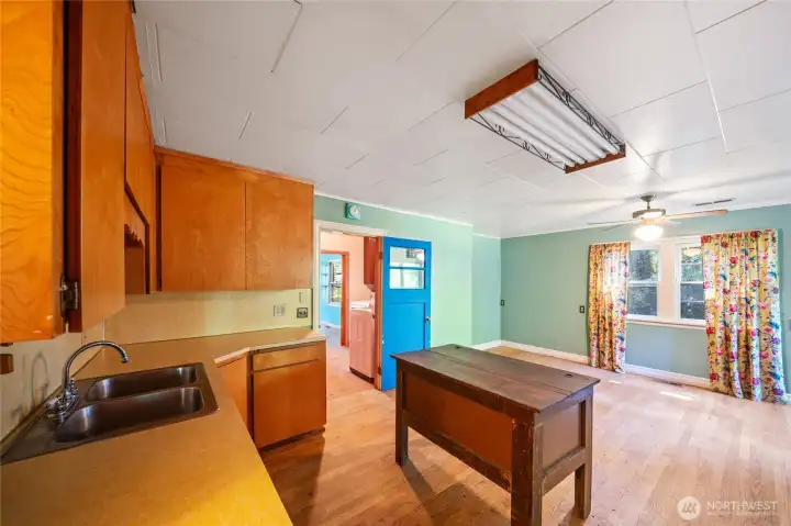 The large kitchen has plenty of room for casual dining