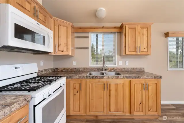 Kitchen with included appliances