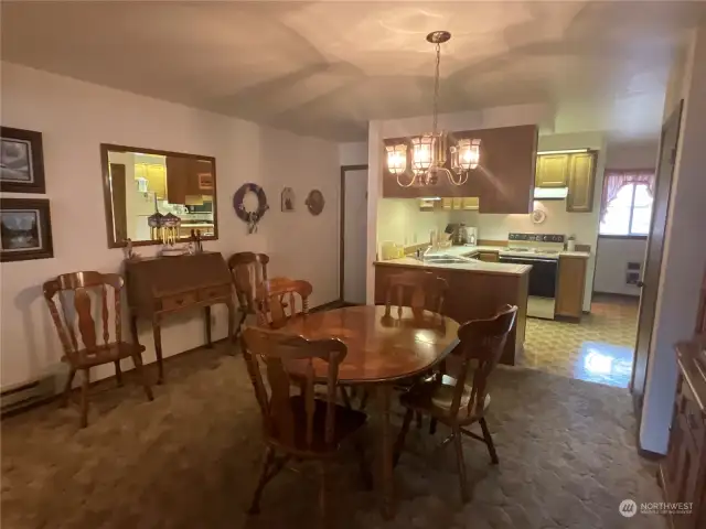 View of dining Room, kitchen and entry from Living Room.