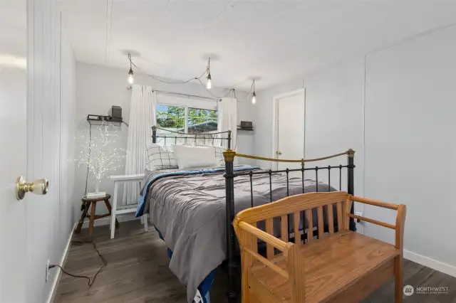 Guest bedroom with a walk in closet.