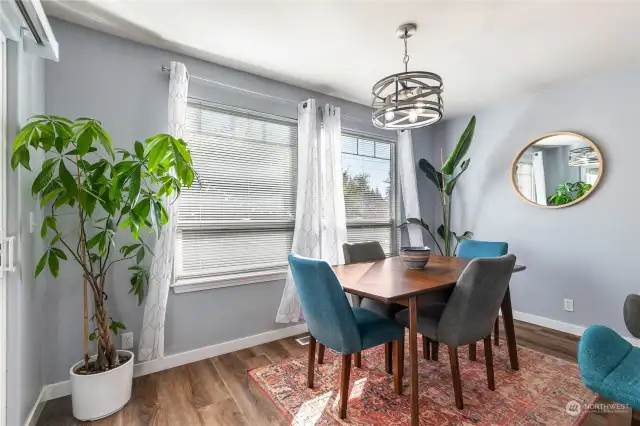 A spacious dining room and back door to the left.