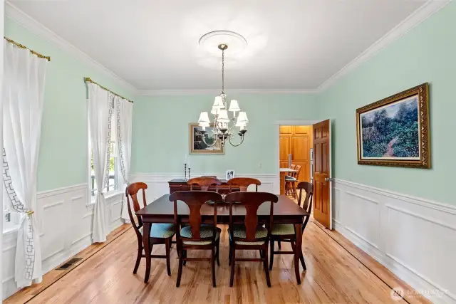 Formal dining room with wainscoting