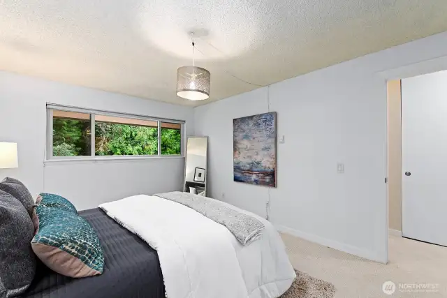 The greenery through the window feels like you're in the forest