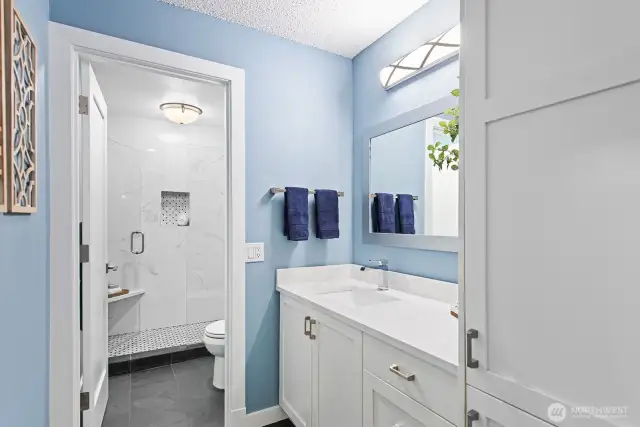 OMG - dreamy spa bathroom. Heated floors, linen cabinet, quartz counters and sexy shower!