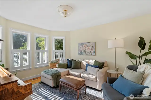 Front living room gives you room to spread out and enjoy the beautiful private front yard.