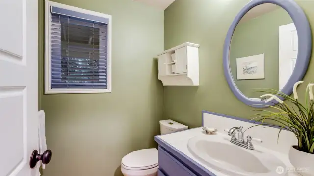 There is a wonderfully updated 1/2 bath with all new utilities.