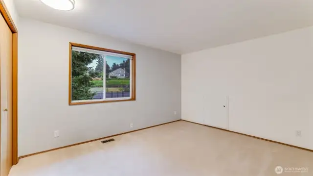This is the 3rd bedroom and has mare sq. ft.  On the far wall the small door open to a fun place to hide and play.