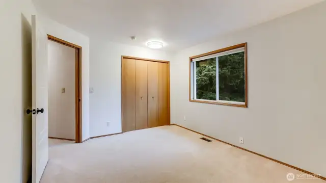 A 2nd view of one of the secondary bedrooms.