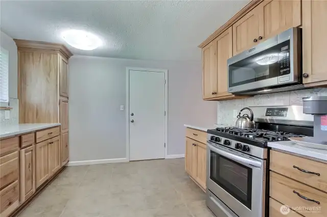 Kitchen view 2 from entry, door leads to your attached garage.