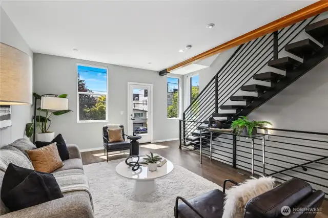 Heading upstairs from the main living…