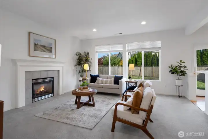 Formal Living room has a gas fireplace.