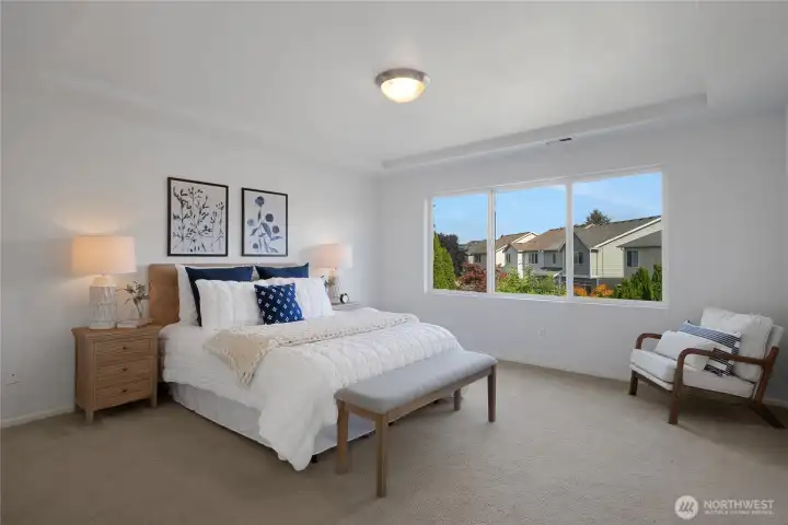 The Primary bedroom is on your left at the top of the stairs...it is a nice size!