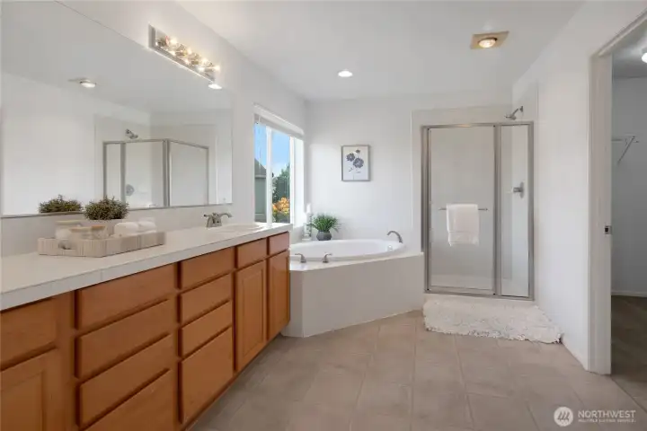 Double Vanity in the Primary Bathroom, along with soaking tub and step in shower.