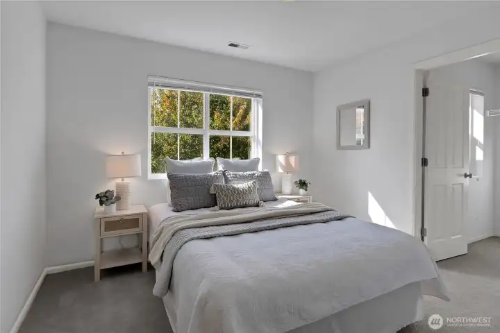 Bedroom #2 upstairs offers a walk in closet and looks out the front of the house.