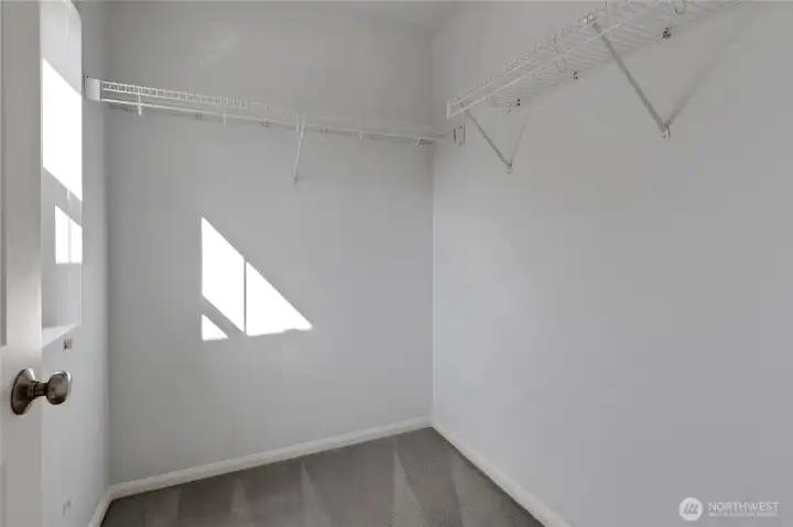 Walk in closet for bedroom #2.