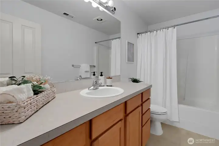 Full Bath upstairs with large Vanity.