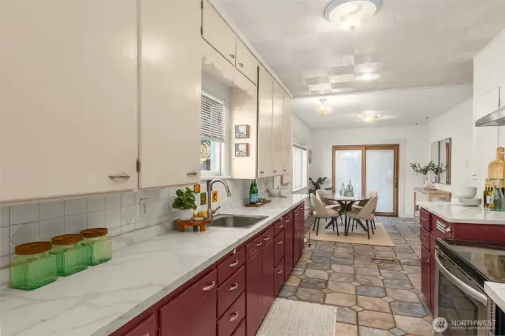 While thick white quartz countertops maintain an elevated timeless aesthetic