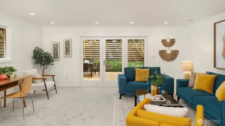 This family room is dreamy - access to the backyard and kitchen for amazing flow.