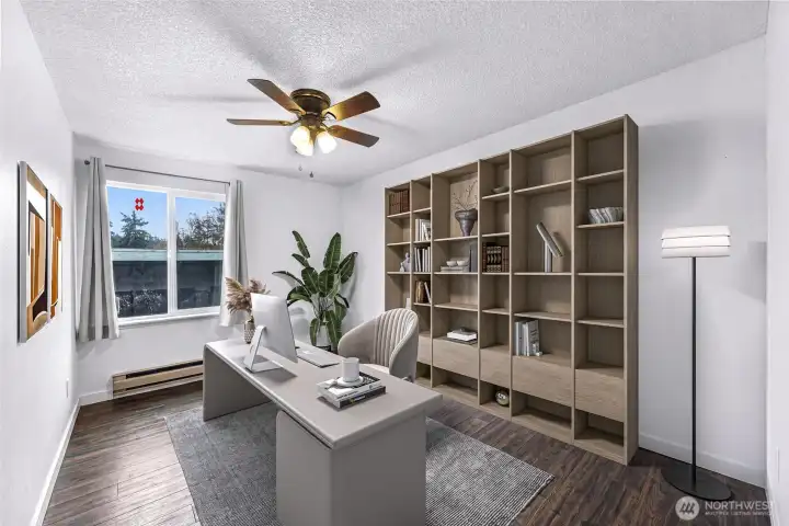 Virtually staged picture of the first bedroom featured as an office