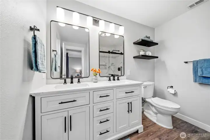 Newly renovated en suite bathroom in primary bedroom.