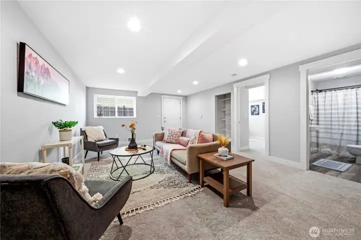 Separate entrance in the lower level family room with bedroom & 3/4 bath offers flexibility for multi-generational living or MIL.