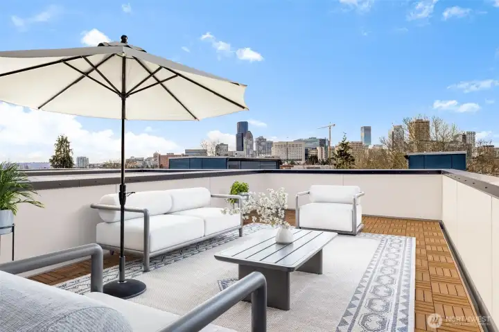Expansive rooftop deck—your private oasis for outdoor lounging and entertaining
