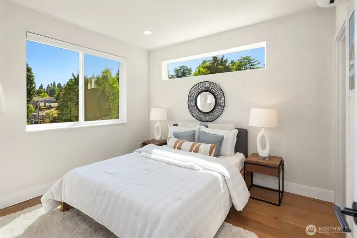 Primary bedroom suite with generus closet + stunning outlook. Primary bedroom suite with generus closet + stunning outlook.