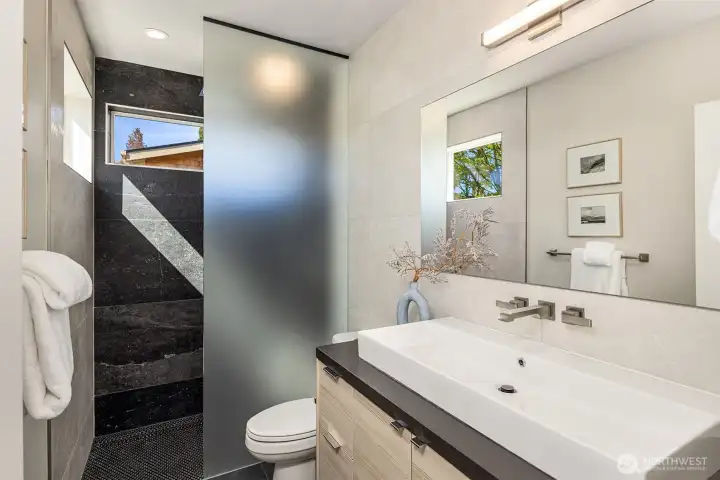 Primary 3/4 bath. Primary 3/4 bath.