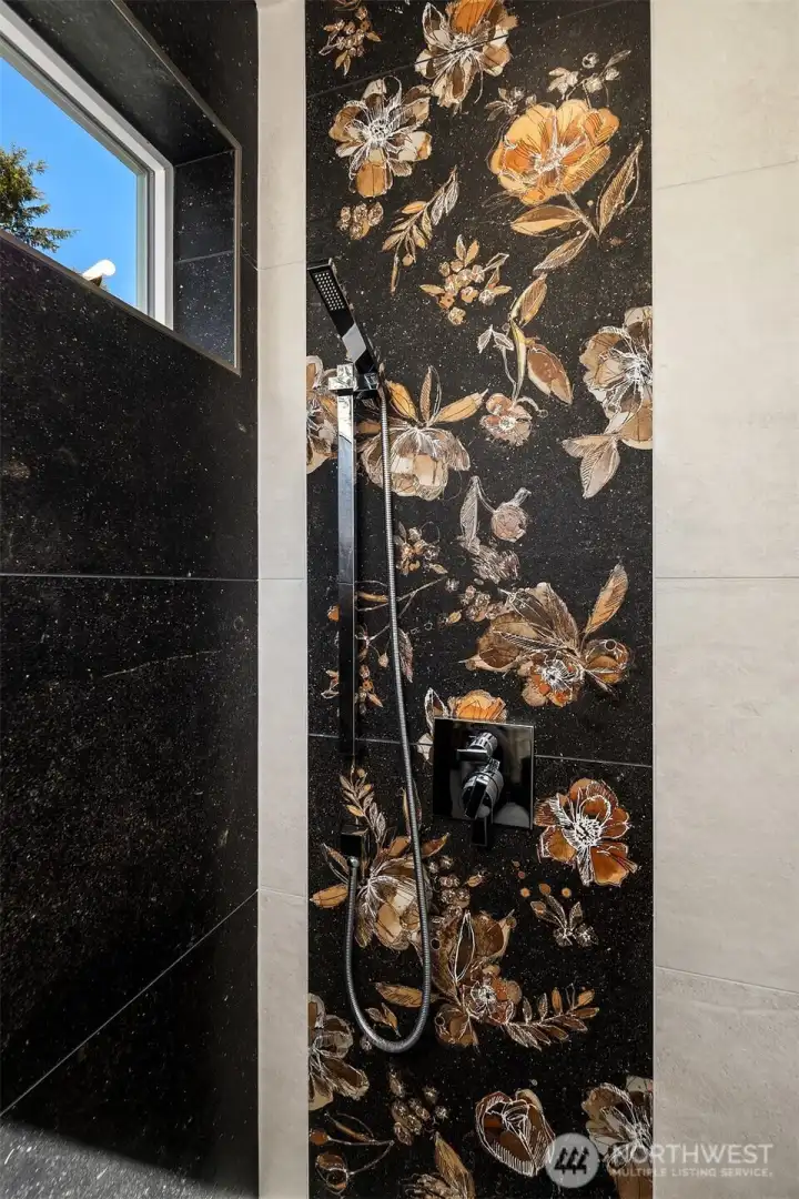 Lovely tile detail in primary bath. Lovely tile detail in primary bath.