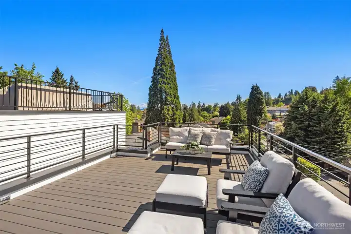 Sunny rooftop with outstanding views in every direction. Sunny rooftop with outstanding views in every direction.