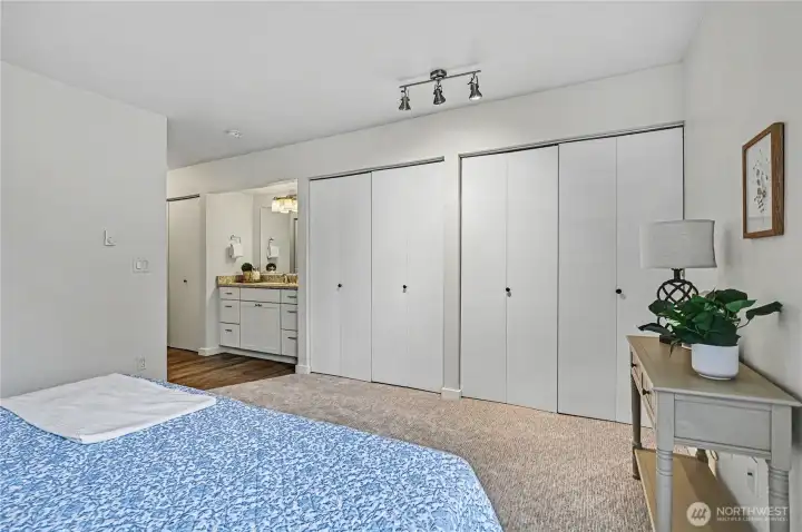 Another view of the primary with sink vanity easily accessible.