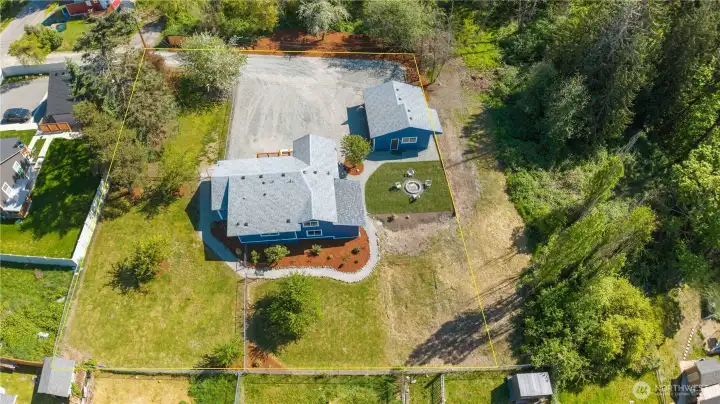 View of Entire Half Acre Lot w/4-Bedroom Home and 3-Car Garage/Shop. (Lines are approximate)