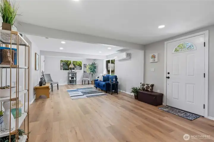 From the Kitchen, View of Living Room and Front Entry.
