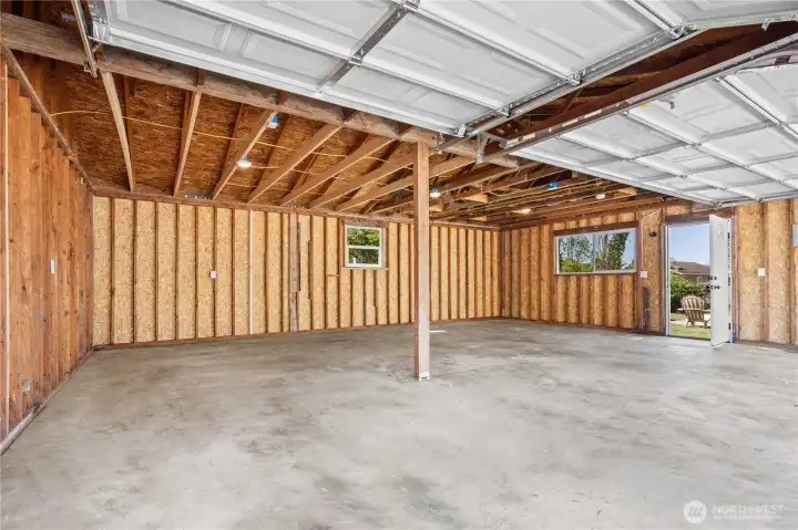 Interior of the Massive 3-Car Garage/Shop. Brand New Siding, Windows, Doors