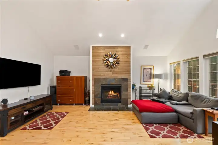 Cozy fireplace creates a warm year-round retreat.