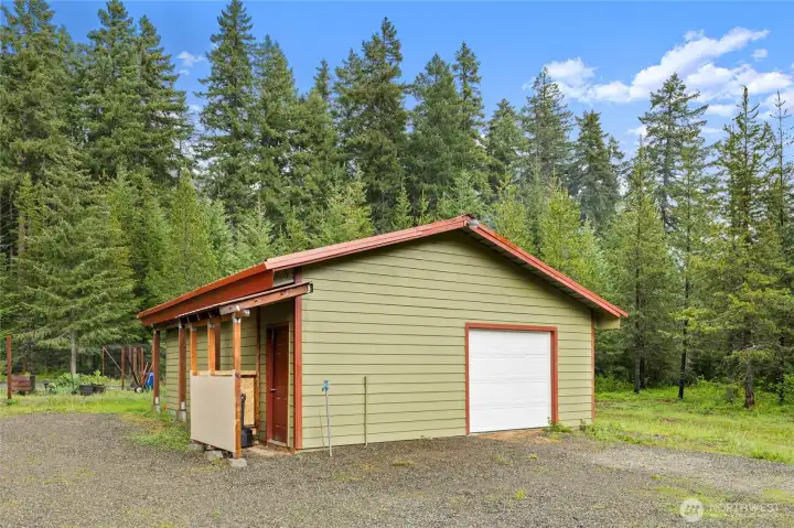 Fully insulated detached shop/garage adds flexible workspace for hobbies, storage, or recreational gear.