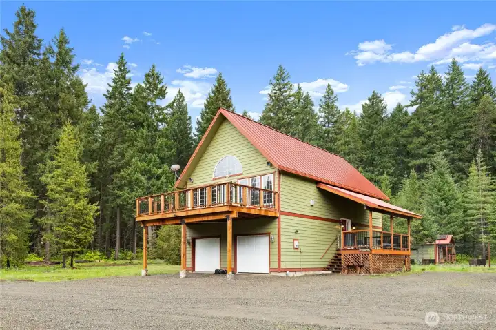 Front view of the home with two car garage.