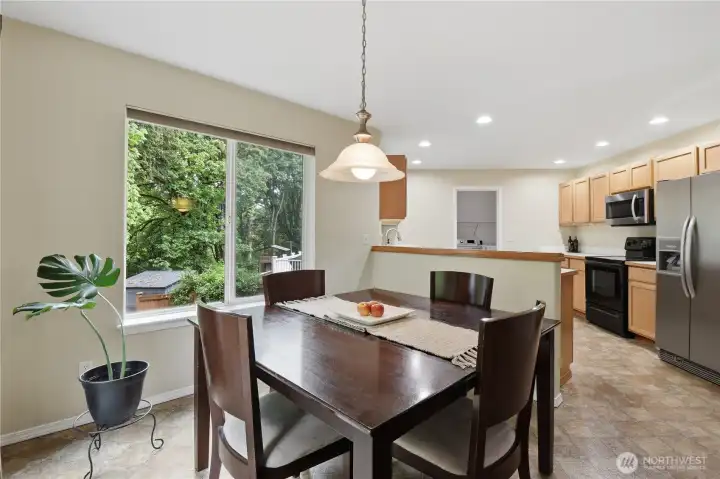 The dining room off of the expansive kitchen.