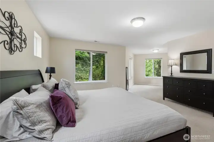 The primary suite has a sitting area that could double as an office or reading nook.