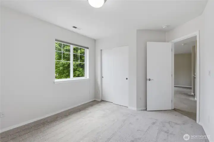 This is another view of the third bedroom.