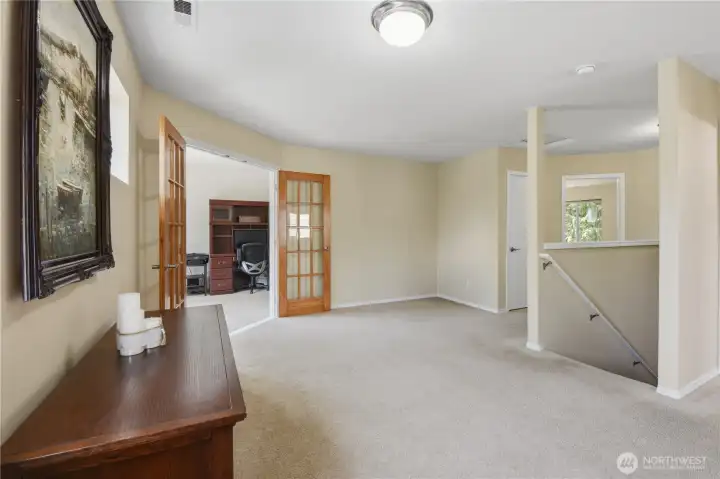 Another view of the bonus area leading into the 4th bedroom.