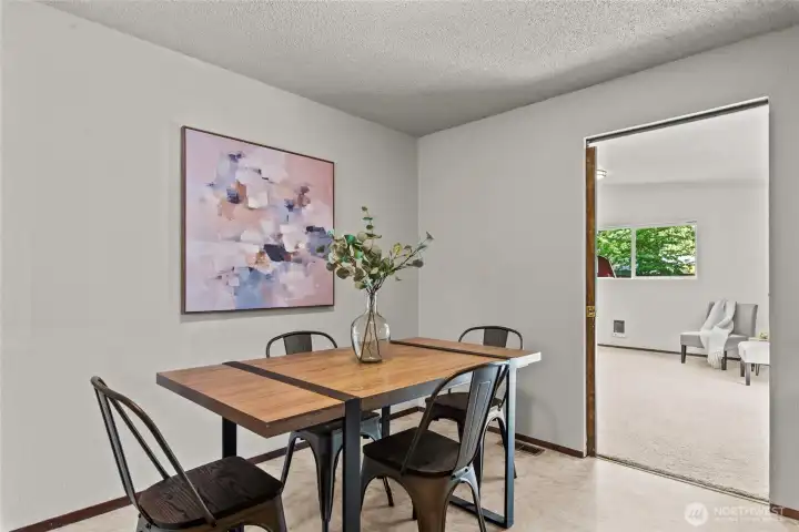 Dining room with entrance to large primary bedroom Dining room with entrance to large primary bedroom