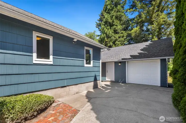 Ample driveway parking, one covered garage space, and two more parking spots in the backyard. Ample driveway parking, one covered garage space, and two more parking spots in the backyard.
