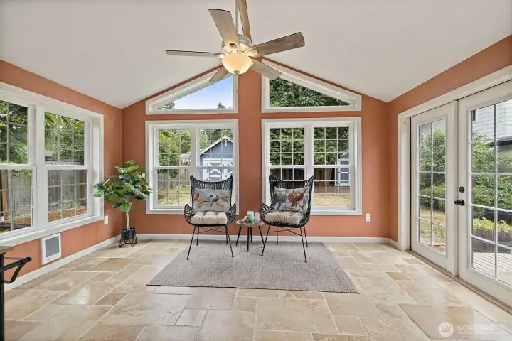 Sunroom with patio french doors to right