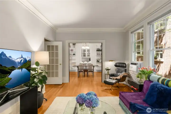 Living room with large windows. A/C unit is included. Living room with large windows. A/C unit is included.
