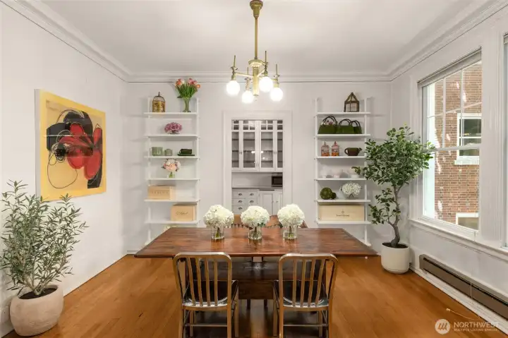 Large dining room with antique chandelier. Large dining room with antique chandelier.
