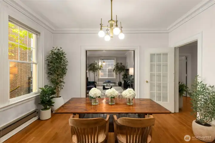Looking back to the living room, which can be closed off w/ pocket doors or left open to connect to dining room. Looking back to the living room, which can be closed off w/ pocket doors or left open to connect to dining room.