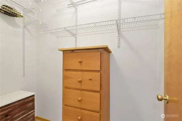 Walk in closet.  Lots of space for clothes and extra storage.